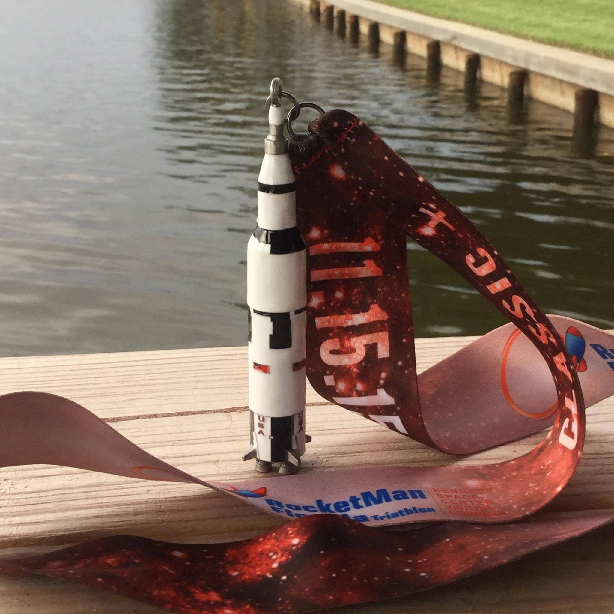 Saturn V shaped finisher's medal for the 2015 Rocketman Florida Triathlon, courtesy Smooth Running